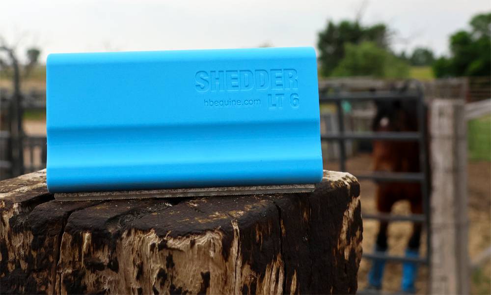 HB Equine Shedder LT grooming blade with ergonomic ABS plastic handle and double-sided replaceable steel blade — lightweight horse grooming tool for shedding and coat care.